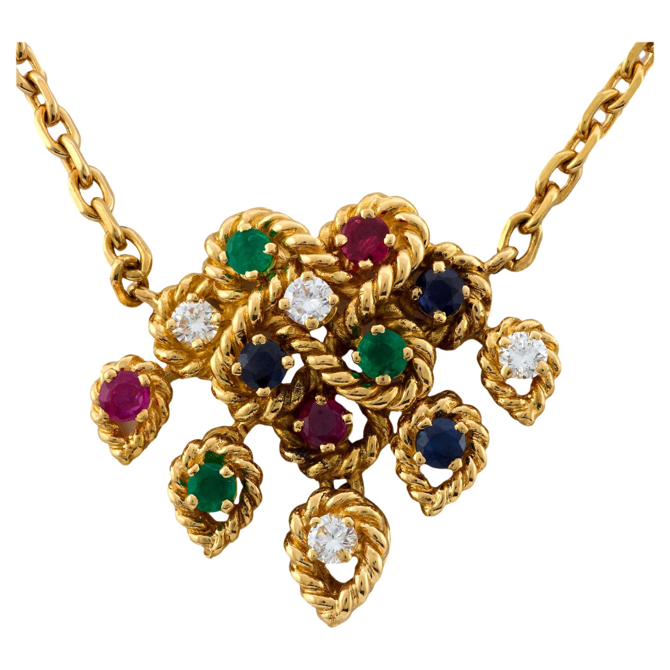 Collier Boucheron en or jaune 18k rubis émeraude saphir diamant en vente