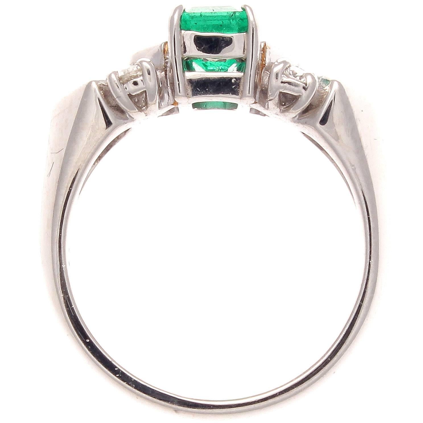 Modern Emerald Diamond Platinum Ring