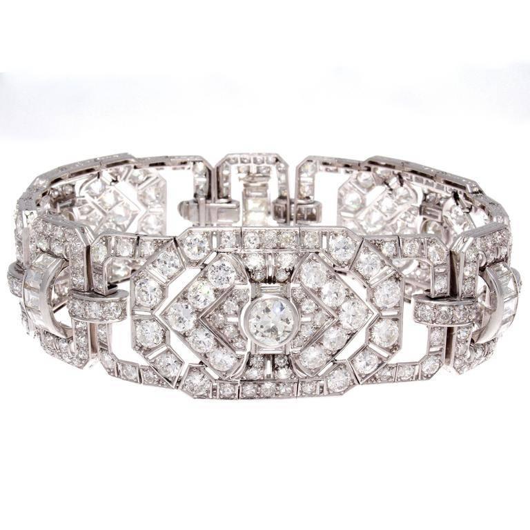 Quintessential Art Deco. Featuring 276 round cut diamonds in a multitude of sizes and 15 emerald cut diamonds all weighing approximately 30 carats, perfectly matched and being F,G color and VS clarity. Hand crafted in well thought out