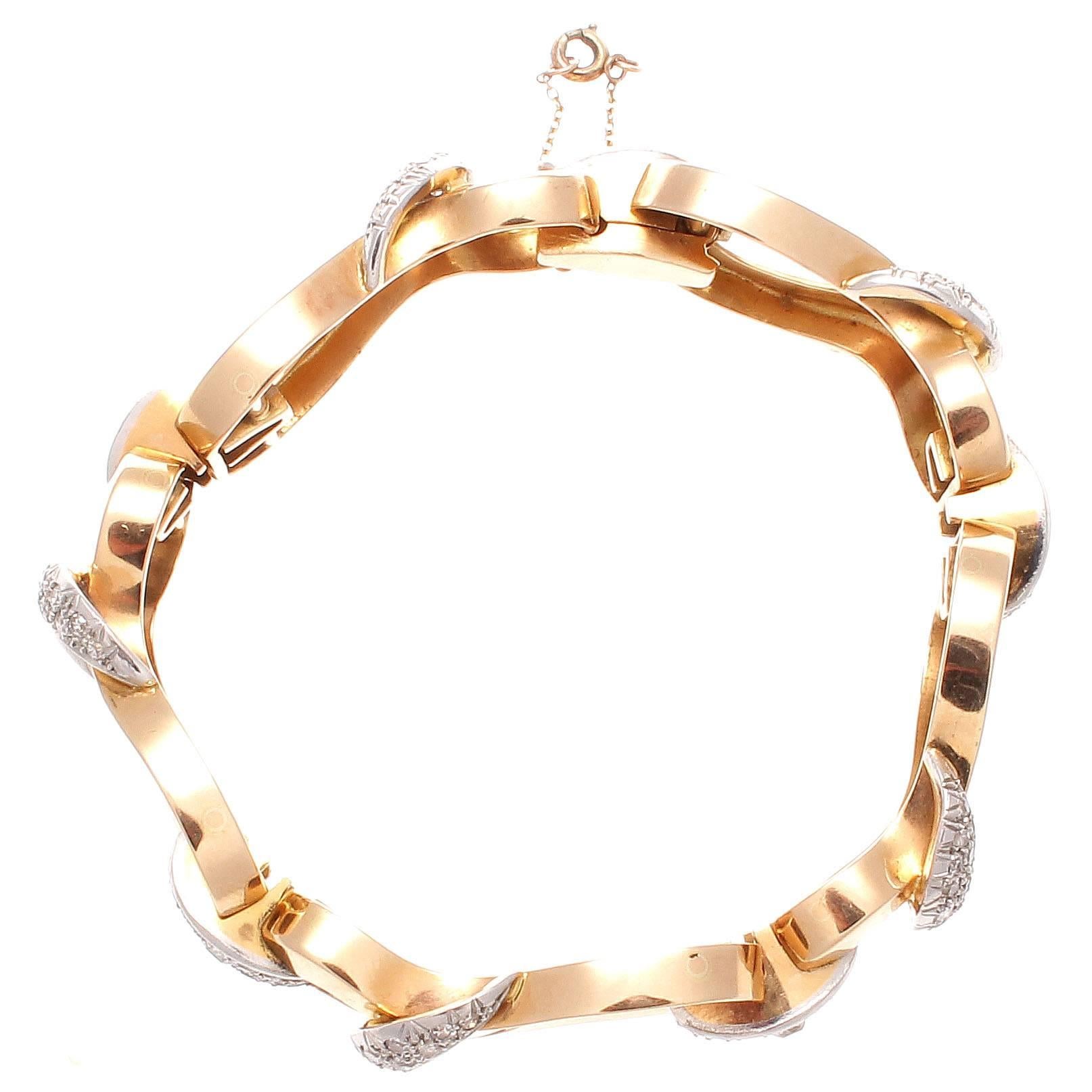 From the very cool retro period comes this well designed and executed diamond gold bracelet. Fun to wear at any soiree it will be much appreciated not only by the old school crowd but also the modern fashionistas. 

Hand crafted in 18k gold. 