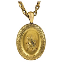 Victorian 18k yellow gold lyre necklace