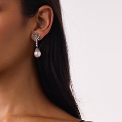 Mid Century 1.75 carat diamond pearl platinum earrings