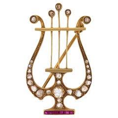 Victorian ruby diamond 18k yellow gold lyre brooch