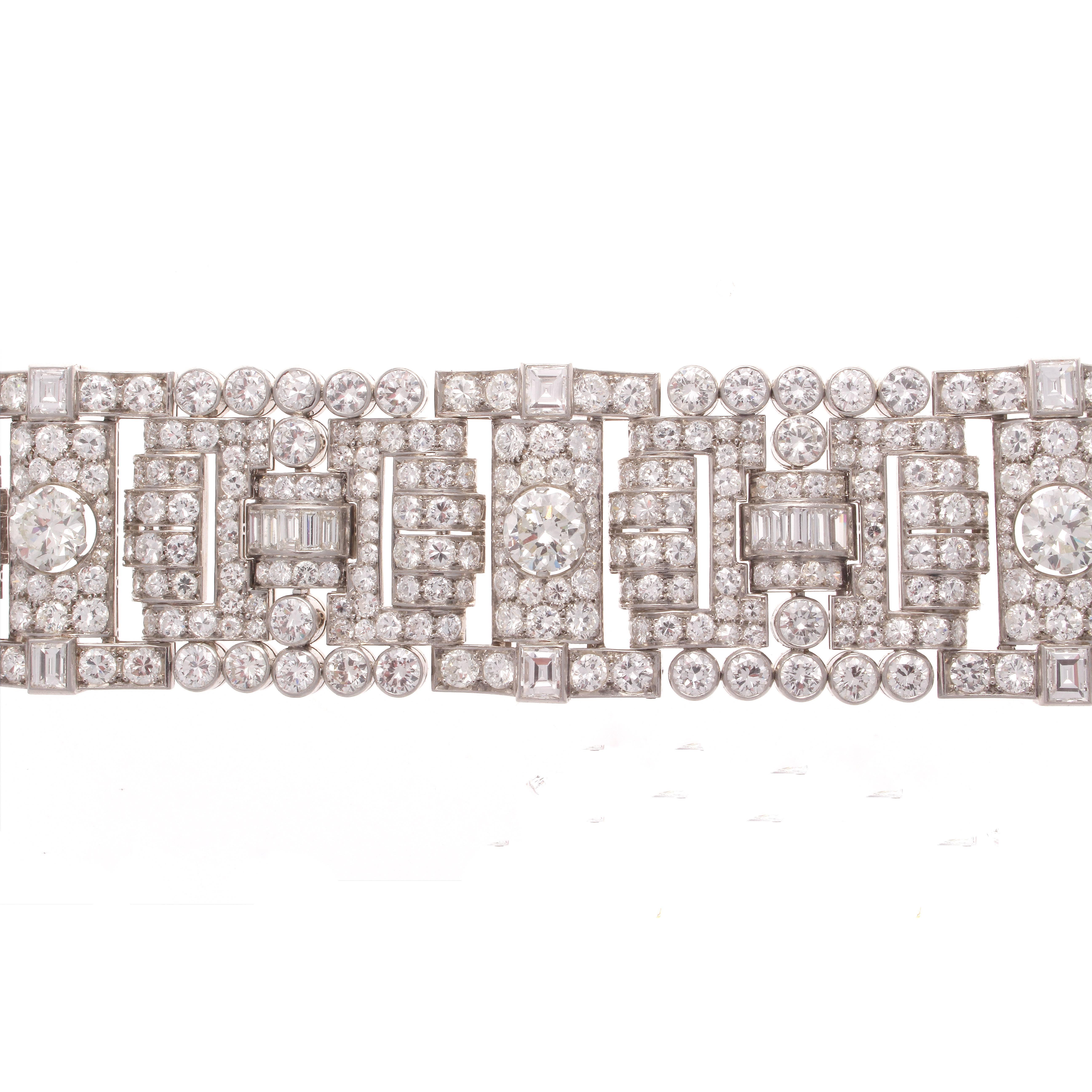 This post retro bracelet has been designed with 4 larger round diamonds weighing approximately 5 1/2 carats. The rest of the diamond laden bracelet is approximately 35 carats to make the total diamond weight approximately 40 1/2 carats. All the