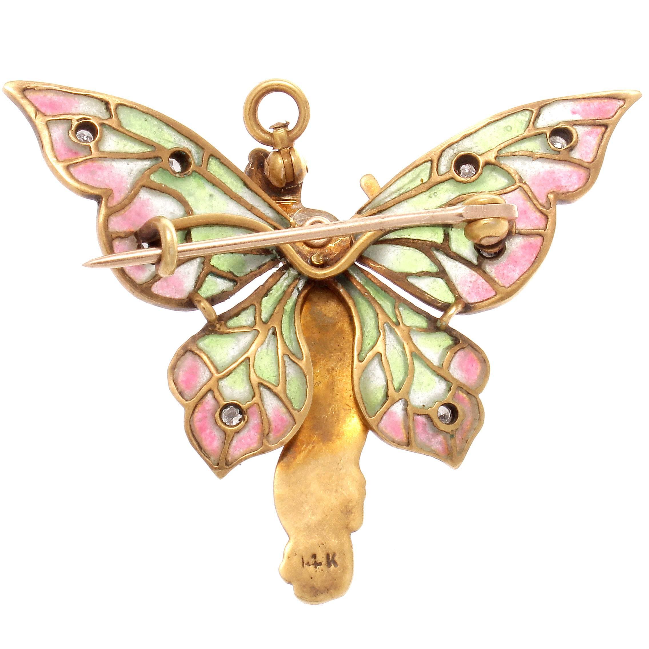 The beautiful young nymph is adorned with multi colored diamond wings. A small work of art that will bring joy to the observer. Crafted in 14k gold.