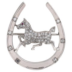 Art Deco diamond ruby 14k white gold horse in horseshoe brooch