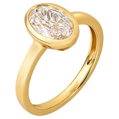 GIA 1.11 carat oval cut diamond 18k yellow gold bezel set ring