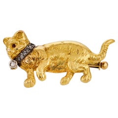 Vintage diamond garnet 21k yellow gold cat brooch