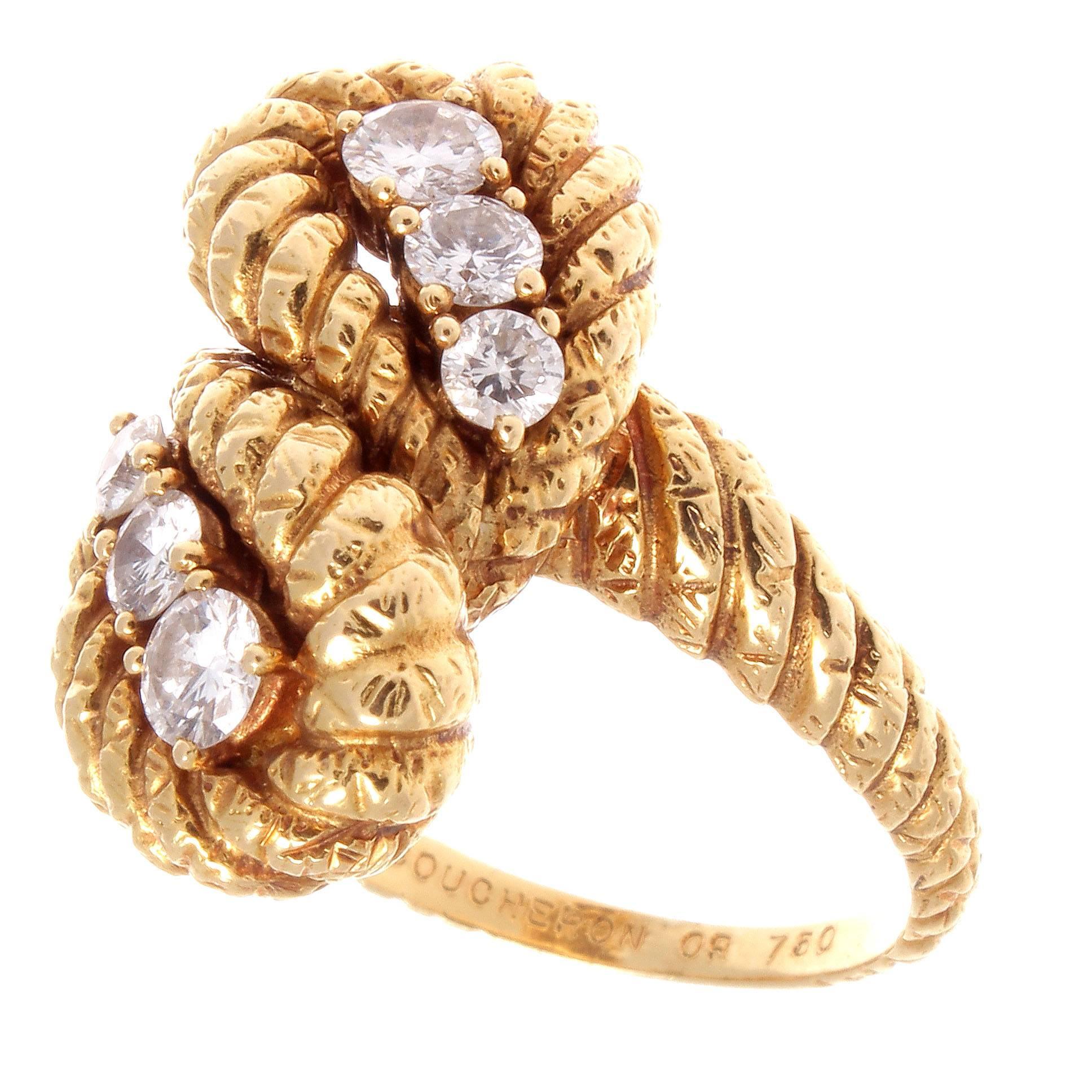 Boucheron is among the top tier jewelers from Paris and is famous for their superior craftsmanship and elegant designs. This easy to own Boucheron is a well designed and executed rope motif diamond ring featuring 6 matching diamonds. Boucheron wears