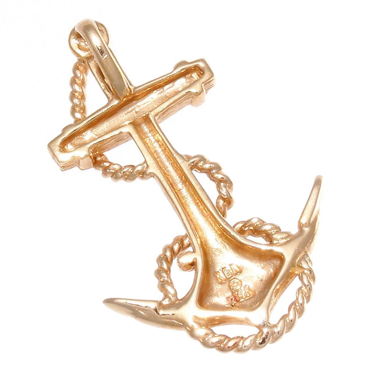 The anchor represents stability and strength, something useful to have when you're in the home port with your loved one.  Crafted in 14k gold and is 1-1/4 inches x 3/4 inches.