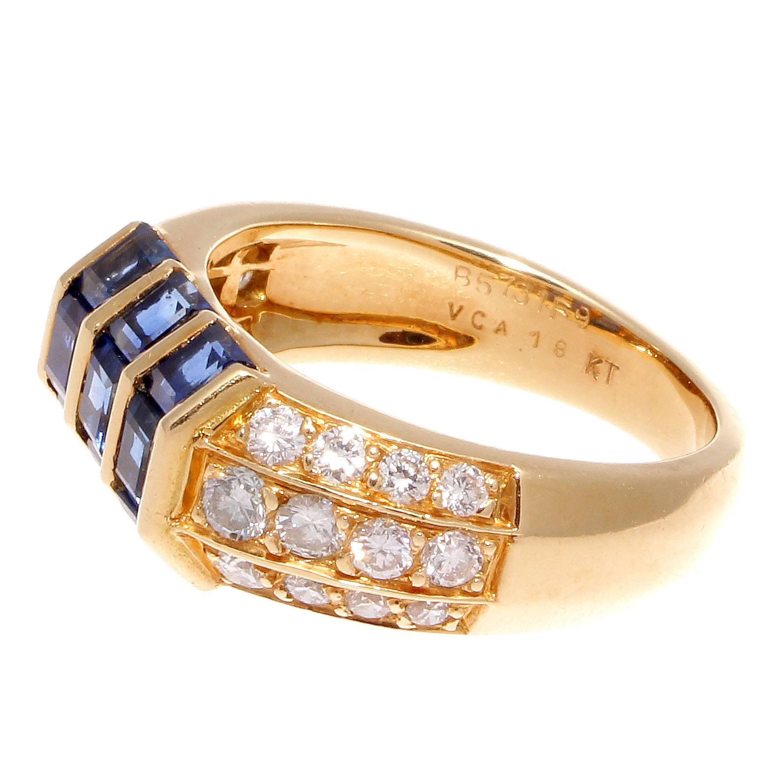 Van Cleef and Arpels mastery is on display with this eye catching design. Featuring 2.36 carats of square cut royal blue sapphires perfectly complimented by shoulders of vertically set colorless diamonds. Crafted in 18k yellow gold. Signed VCA,