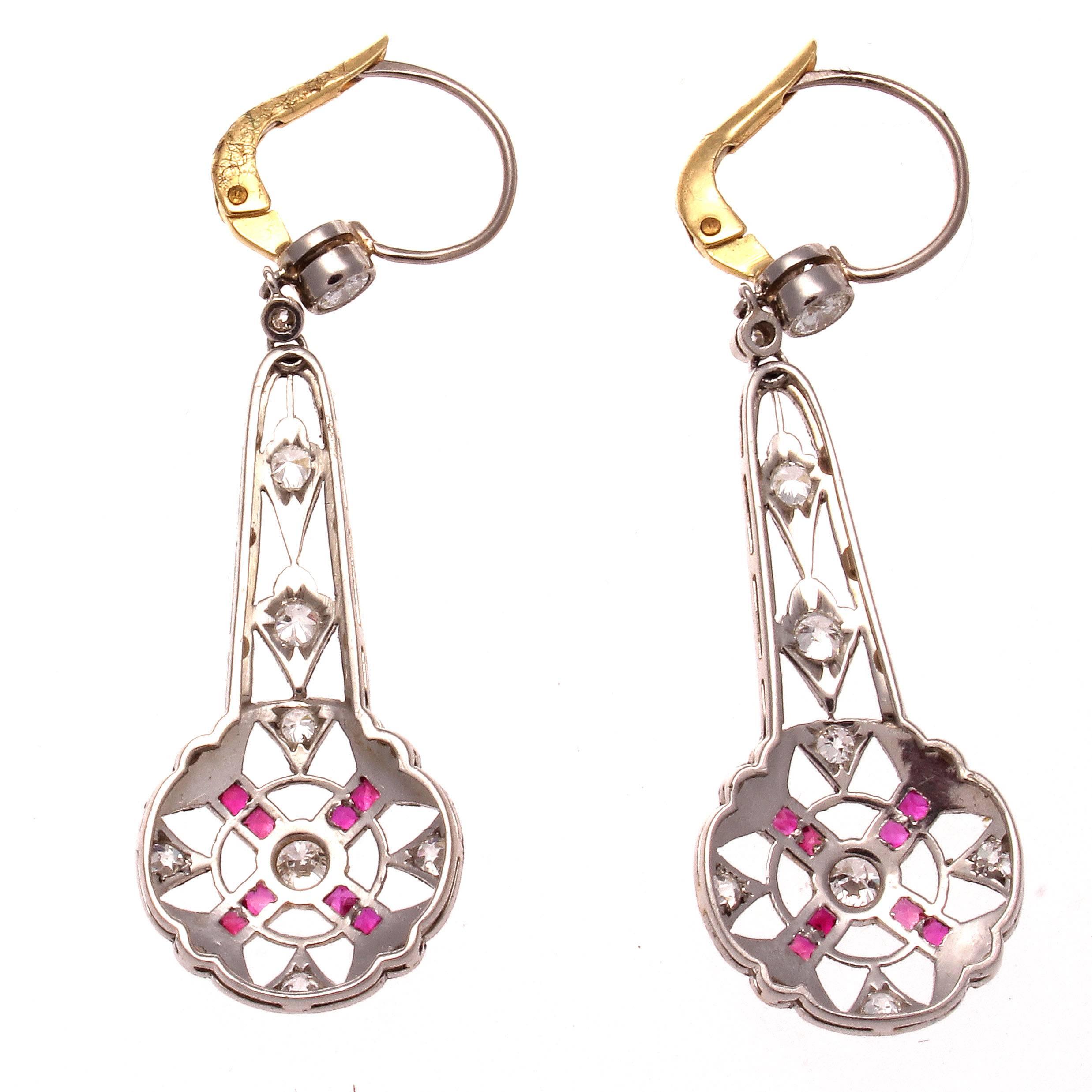 Brilliance through artistic design influenced by the era that changed jewelry forever. The art deco earrings focus on the use of color and symmetry to create this eye pleasing design. Featuring numerous perfectly placed diamonds that is perfectly