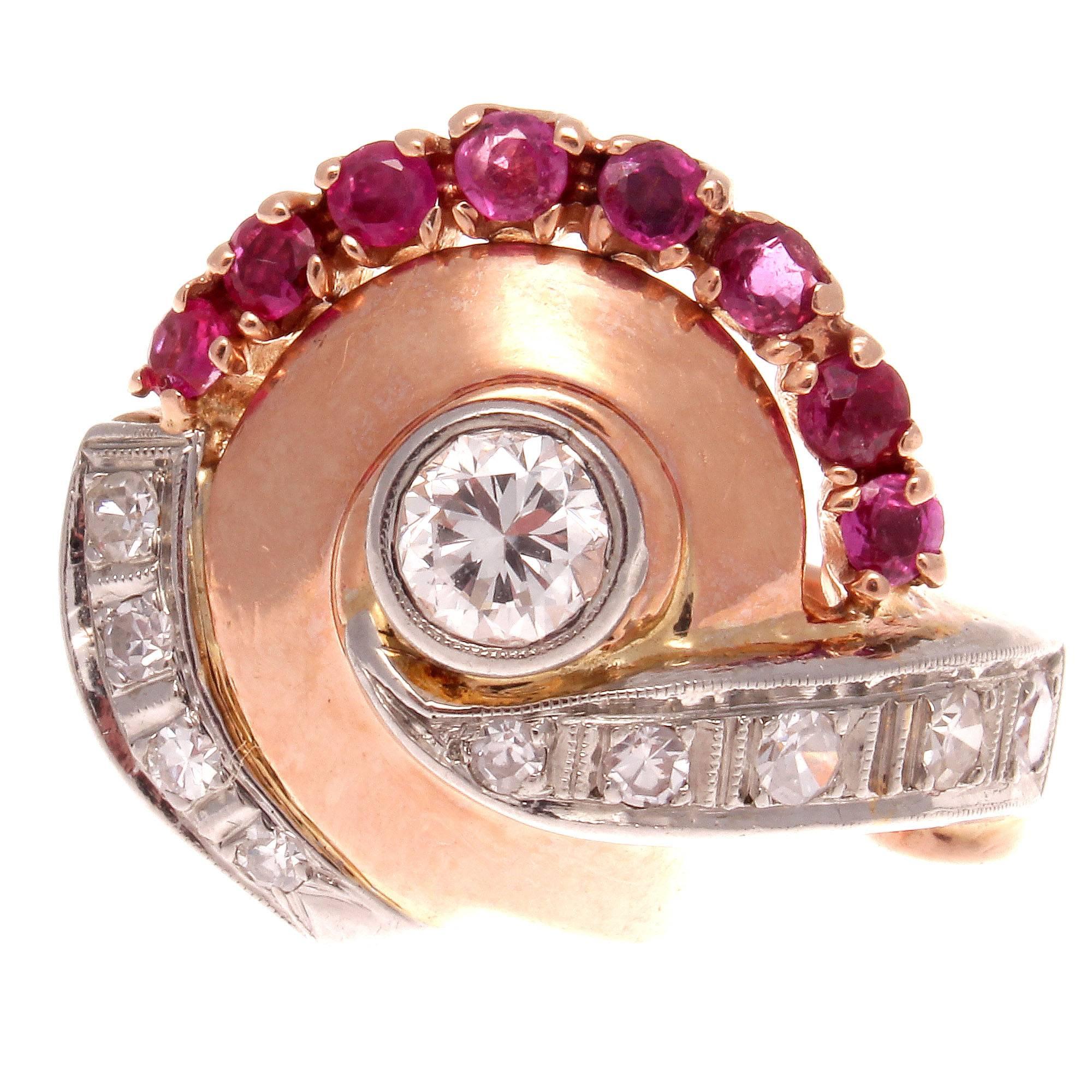 Retro jewelry is defined by bold designs and colorful gemstones. Featuring a swirl of fascination that is created with numerous near colorless diamonds and vibrant red rubies. Designed with the classic use of 14k pink gold.

