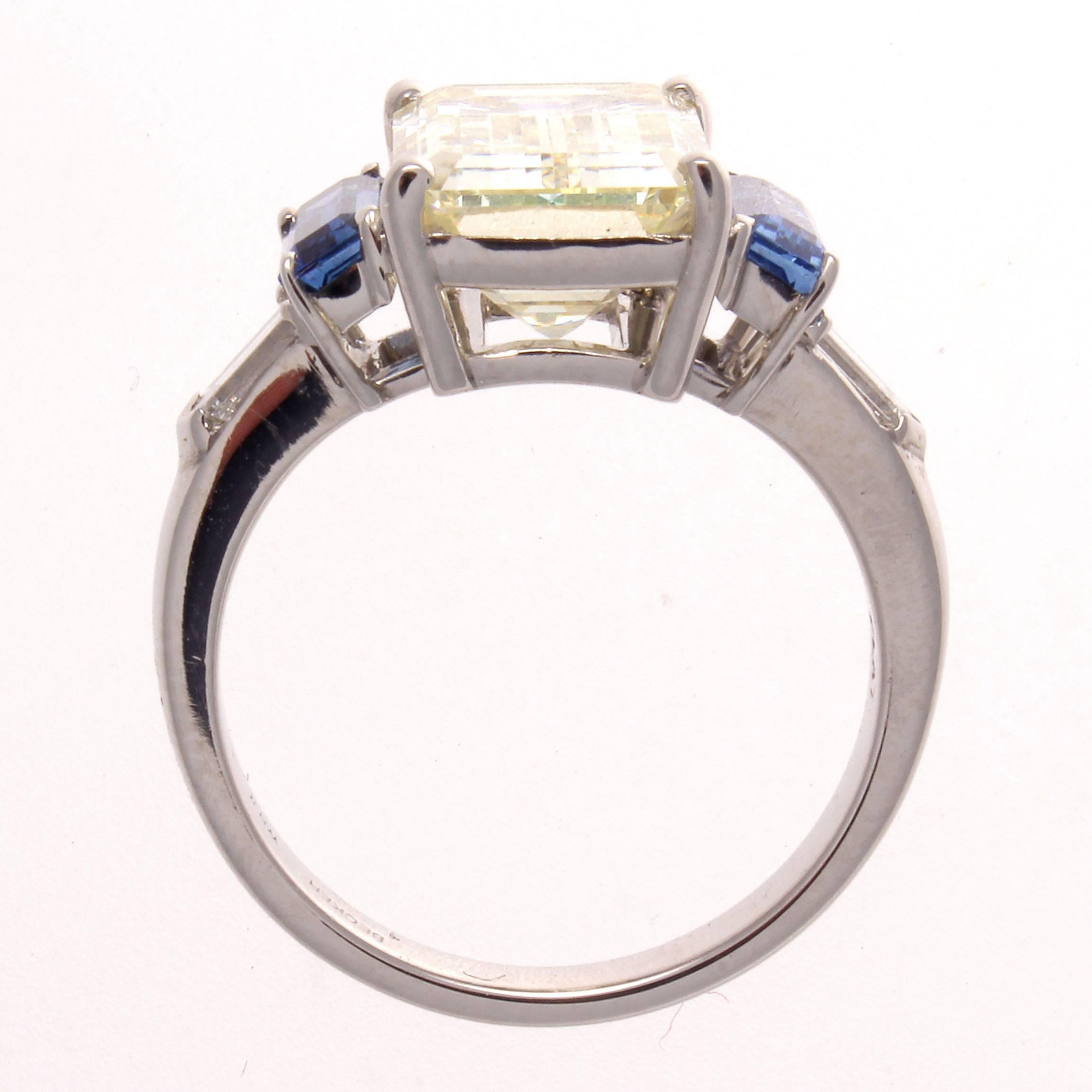 Modern 5.14 Carat Emerald Cut Diamond Sapphire Platinum Ring