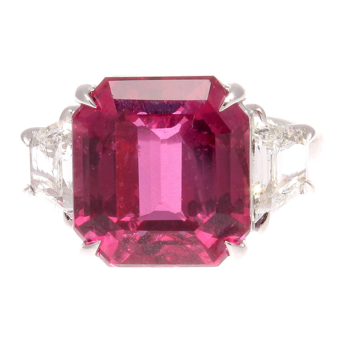 The superior gem quality of the ruby is evident by the clarity and vividness of the color. Rubies with strong color and an absence of eye visible clarity characteristics are rare and desirable. 

Featuring a 10.02 carat SSEF certified reddish-purple