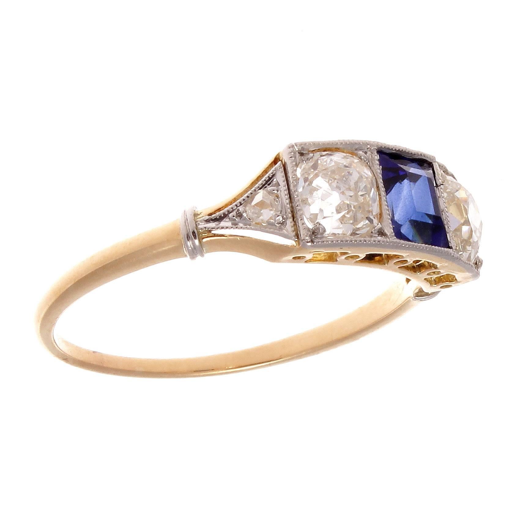 Extravagance that rebuilt Europe after the first World War by fusing geometry and symmetry to create masterpieces that still have heavy influences on art and fashion today. Featuring an approximately 0.75 carat bright blue sapphire that is accented