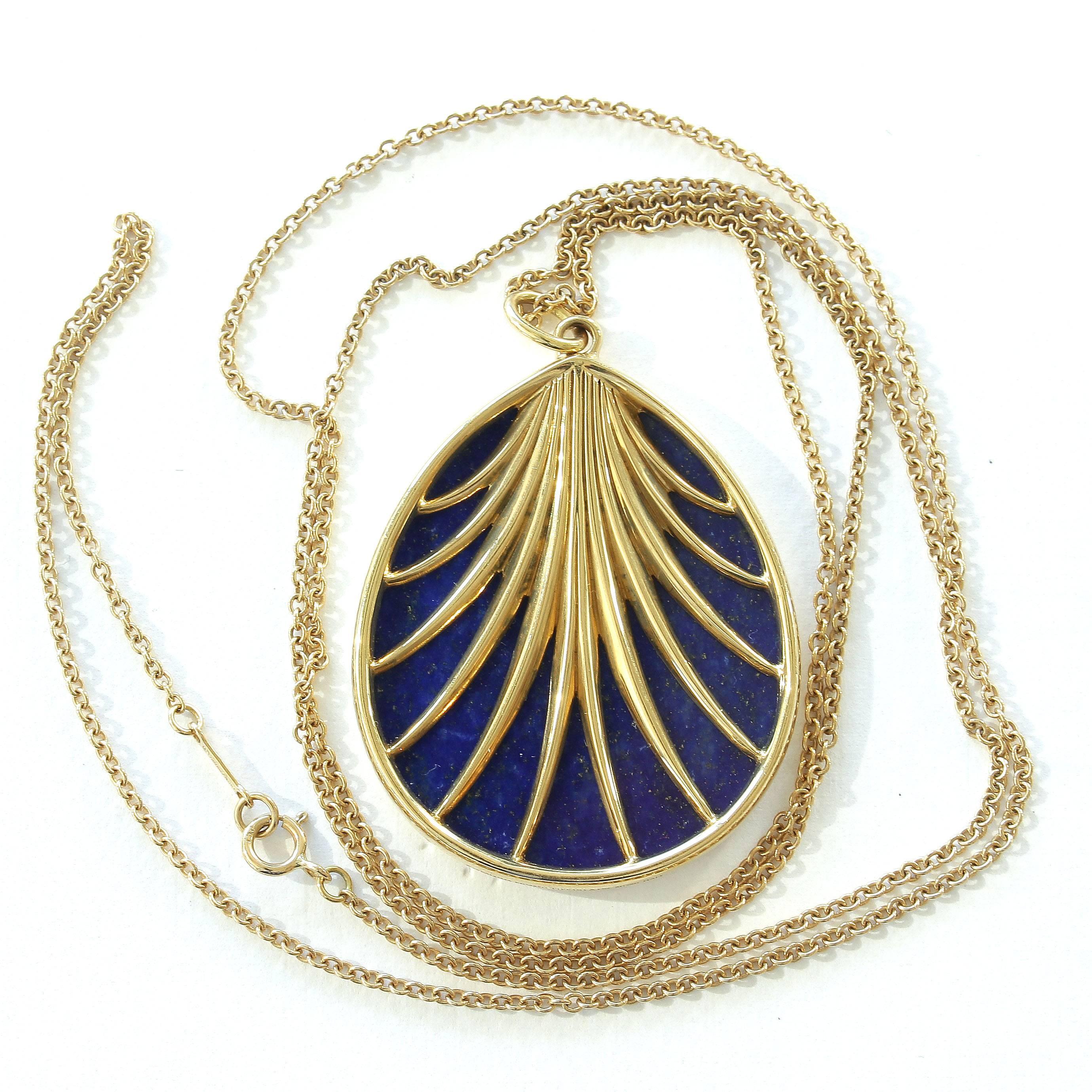 Creativity runs deep in the Picasso family. Featuring a palm tree of gold that has been painted on multihued blue lapis lazuli. Crafted in 18k gold. Signed Tiffany & Co. Paloma Picasso.