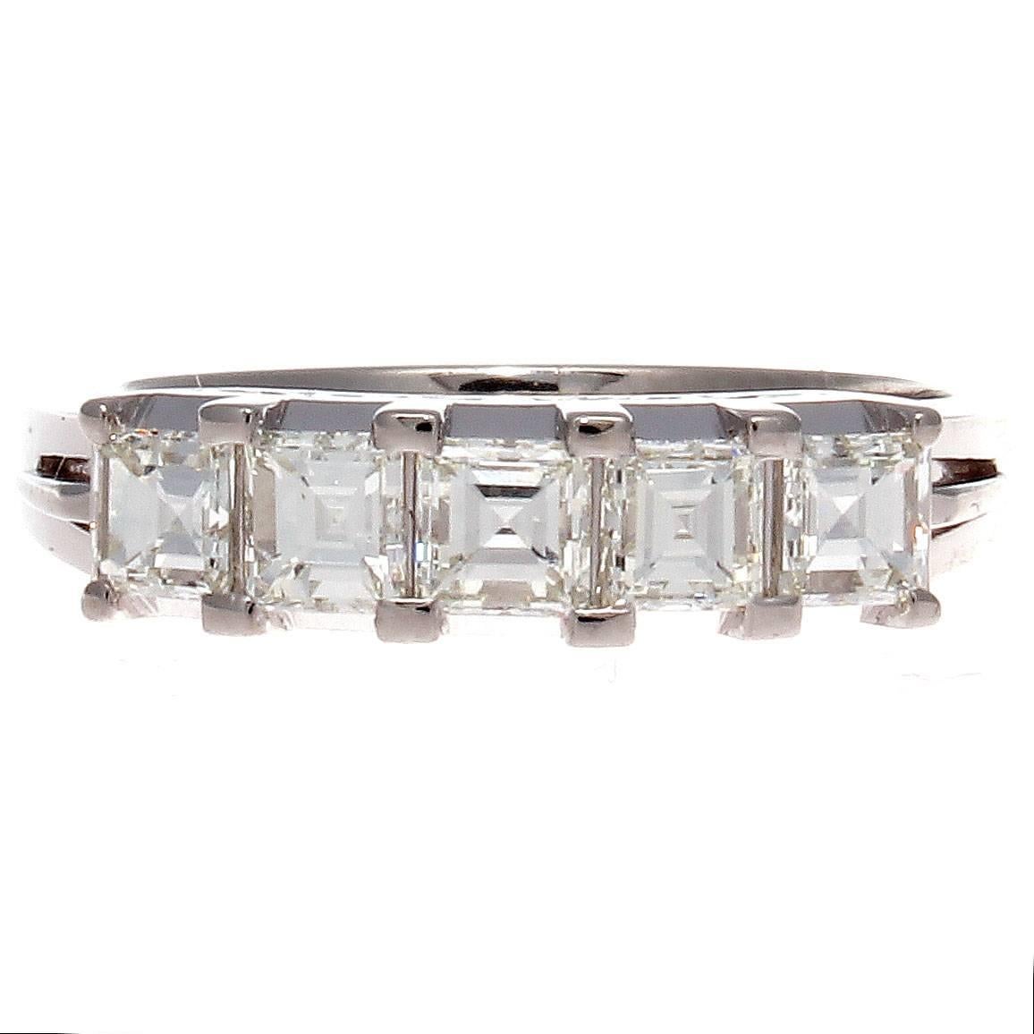 Timeless and elegant beauty in this traditional 5 stone ring. Well matched clean white asscher cut diamonds weighing exactly 1.03 carats. H-I in color and VS+ in clarity. Crafted in platinum.

Ring size 6 and may be resized.