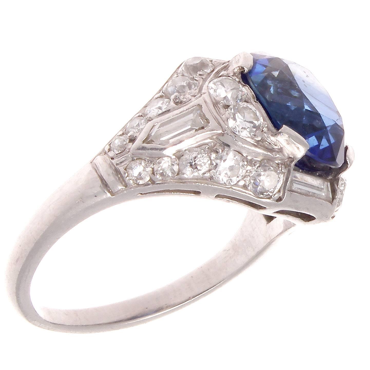 Art Deco brilliance is predicated from the combination of color, symmetry and elegance that is portrayed through its unique designs. Featuring an approximately 4 carat royal blue sapphire that is considered as gem quality because of it's rich color