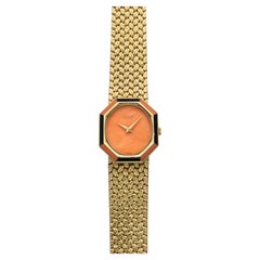 Piaget 9341 D2 vintage degli anni ’80, con movimento integrato, cassa in oro 18 carati, quadrante color corallo, carica manuale, 25 mm