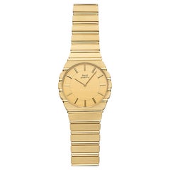 Vintage 1980s Piaget Polo 7661 C 701 18K Yellow Gold Gadroon Dial Quartz 34mm