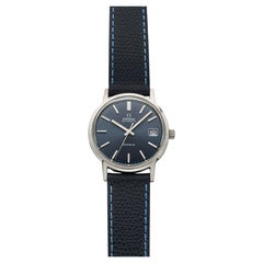 Omega Genève des années 1970, acier inoxydable, cadran bleu « sunburst », mouvement automatique, 35 mm