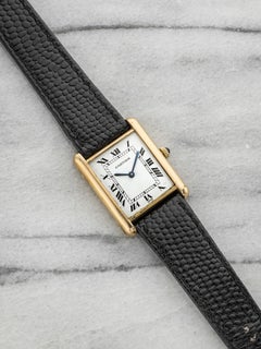 Vintage 1970s Cartier Tank Louis 78086 18K YG White Roman Dial Manual 23mm