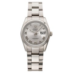 2002 Rolex Day-Date 118209 18K White Gold Silver Roman Dial Automatic 36mm