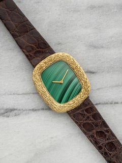 Movado Ellipse vintage des années 1970, en or jaune 18 carats, cadran en malachite, remontage manuel, 32 mm
