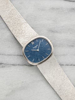 Vintage Patek Philippe Ellipse 3545 aus den 1970er Jahren, 18 Karat Weißgold, blaues Leinenzifferblatt, Handaufzug, 32 mm