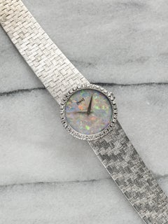 Montre vintage Piaget 9706 pour femme des années 1980, en or blanc 18 carats, cadran opale, lunette sertie de diamants, remontage manuel, 24 mm