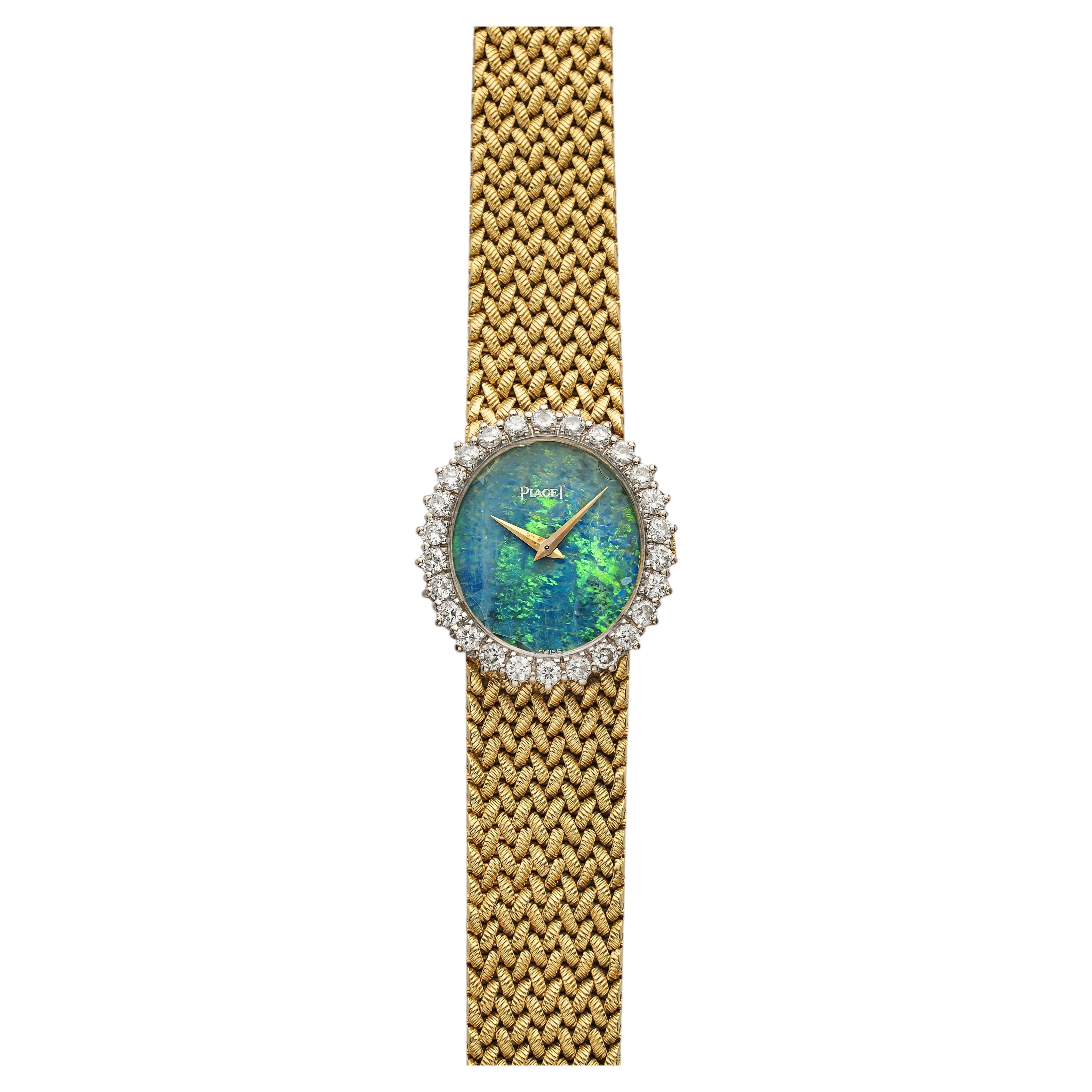 Montre Piaget 9821 D3 vintage des années 1970, en or jaune 18 carats, cadran opale, lunette sertie de diamants, remontage manuel, 27 mm