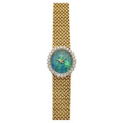 Piaget 9821 D3 vintage degli anni '70, oro giallo 18 carati, quadrante con opale, lunetta con diamanti, carica manuale, 27 mm