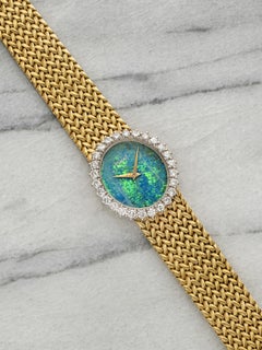 Piaget 9821 D3 vintage degli anni '70, oro giallo 18 carati, quadrante con opale, lunetta con diamanti, carica manuale, 27 mm