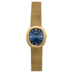 Vintage 1970s Patek Philippe Ellipse 3589/1 18K Yellow Gold Blue Dial Auto 33mm