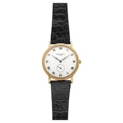 2000s Patek Philippe Calatrava 3919 18K Yellow Gold White Dial Manual 33mm