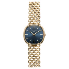 Vintage 1990s Patek Philippe Ellipse 3844 18K YG Blue Sunburst Manual 34mm