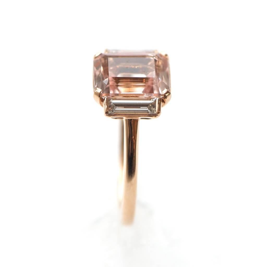 3ct Emerald Cut Morganite with 0.42cts of baguette diamonds set in our handmade 18k rose gold Rosie Setting.

Very low profile, fantastic for day-to-day wear.
Elegant and regal demeanor.
1.8mm wide rose gold band. 