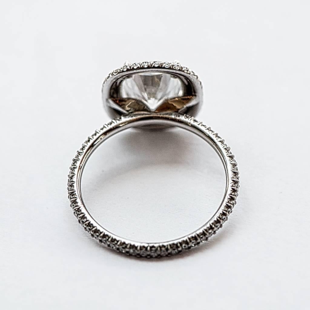 2.03ct I color SI1 clarity Cushion Brilliant Cut Forevermark diamond in our handmade double row platinum and diamond micro-pave InLove setting.

This ring sits perfectly flush with a matching wedding band.

1.5mm wide platinum band with diamonds all