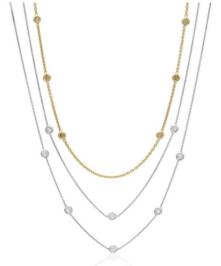 Five Round 0.04 Carat Diamonds shown in 18k White Gold with five Diamond stations on a 18K White Gold Cable Chain.

Also available in 18k Rose Gold and 18K Yellow Gold