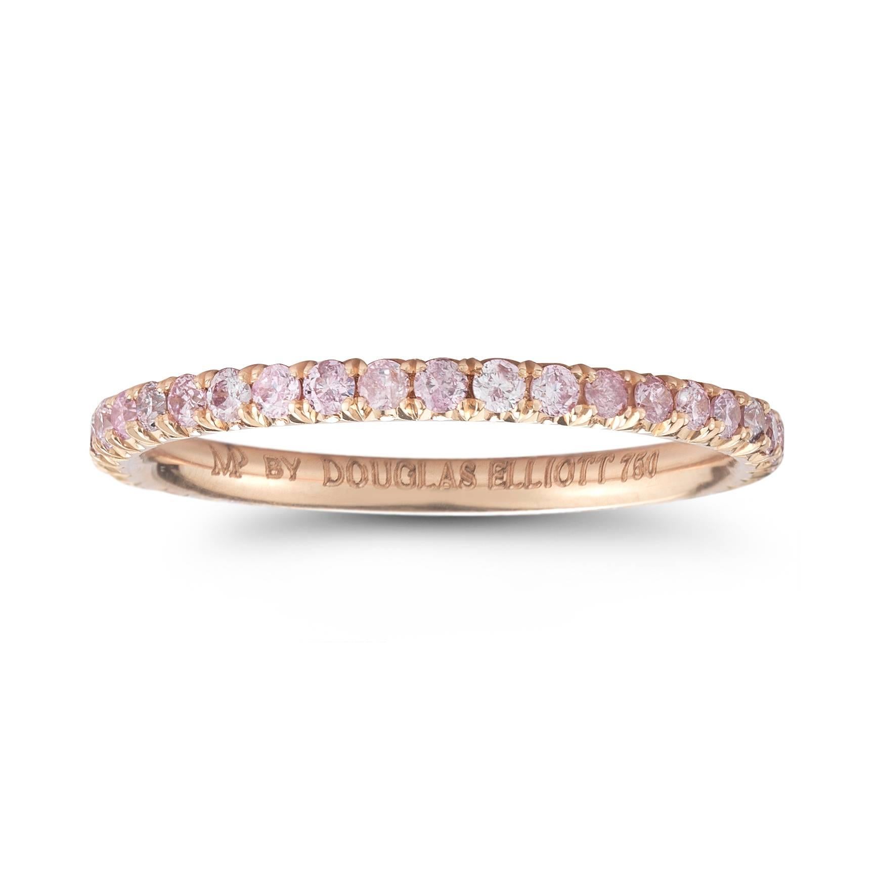18k rose gold fancy pink micro pave eternity band. Impossibly thin, this hand crafted band features .39 carats of fancy pink diamonds. Made in New York City, each diamond is hand set into a solid piece of 18k rose gold under a microscope. All the