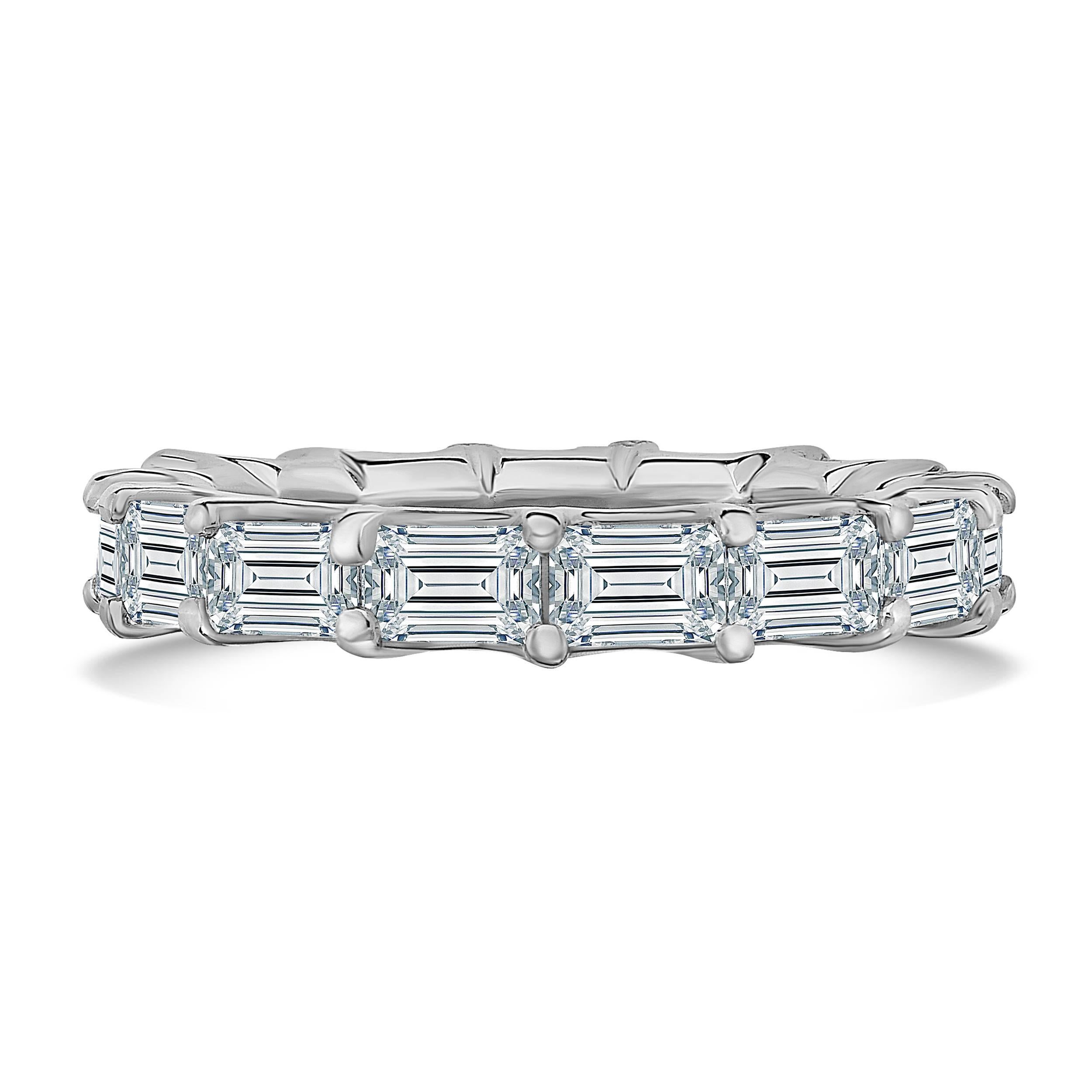 Stunning 3.30 carat emerald cut diamond eternity band made of 15 perfectly matched H color VS clarity emerald cut diamonds, each of which is securely set in a "U" setting that allows you to see the sides and bottom of the diamond making
