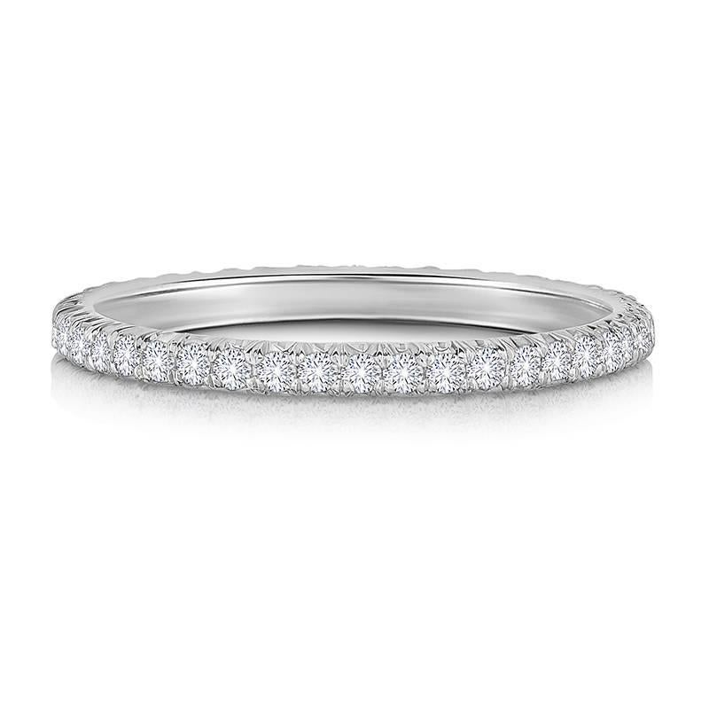 Marisa Perry's one point diamond eternity band in platinum. This diamond eternity band makes the perfect wedding band. Also popular as push presents and anniversary gifts. This band is stackable with other eternity bands and sits flush to most