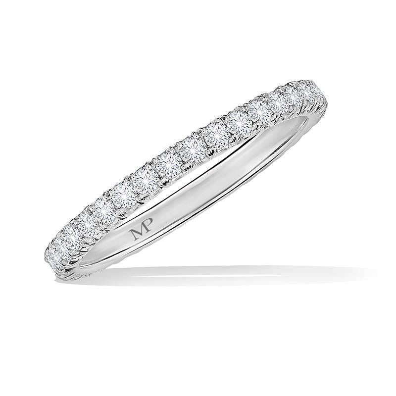 Marisa Perry's three point diamond eternity band in platinum. This diamond eternity band makes the perfect wedding band. Also popular as push presents and anniversary gifts. This band is stackable with other eternity bands and sits flush to most