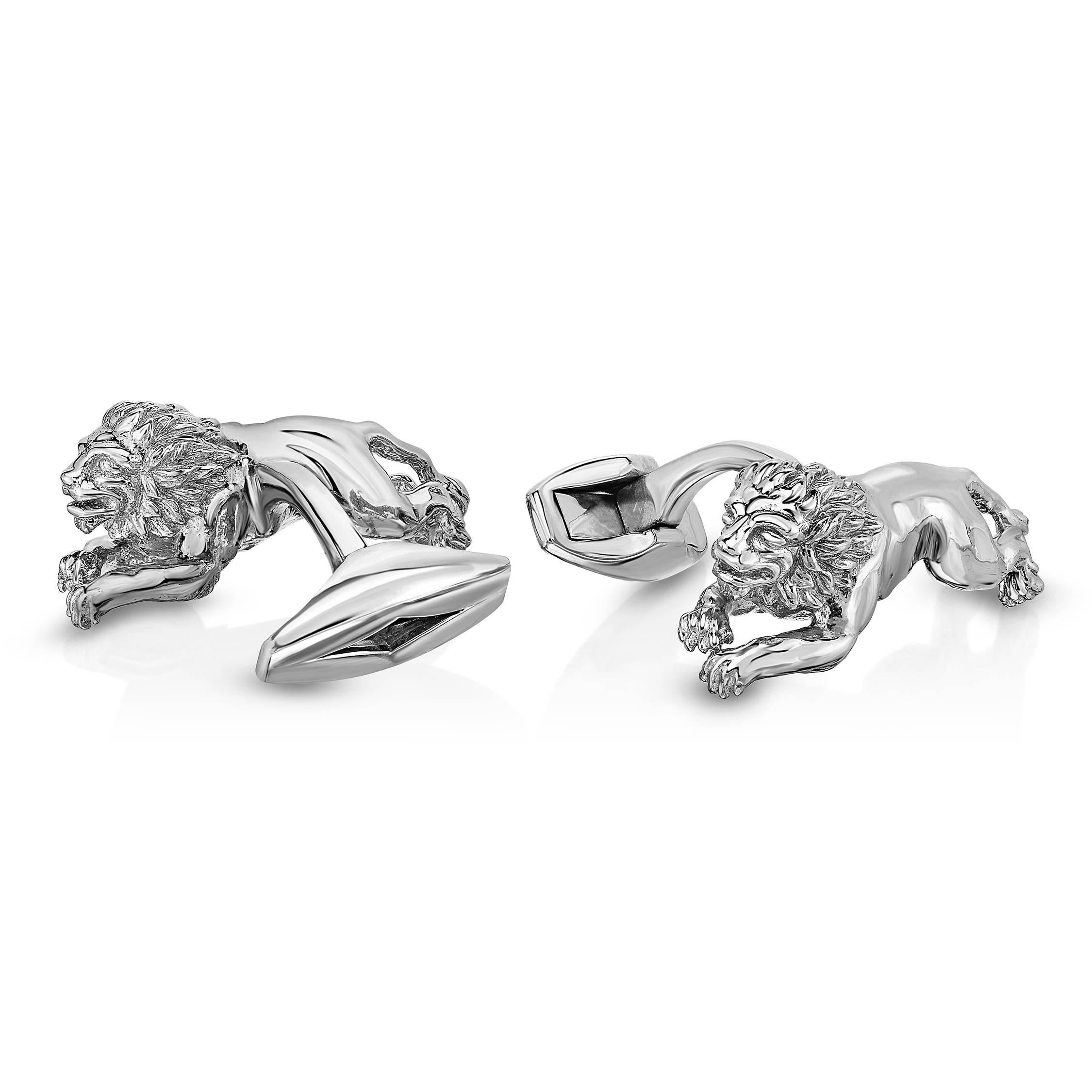 Sterling Silver and Diamond cufflinks hand crafted in New York City. Perfect as a Father's Day gift or for any cufflink lover in your life. 

These Sterling Silver cufflinks were three dimensionally carved by a master jeweler. The Diamond eyes were