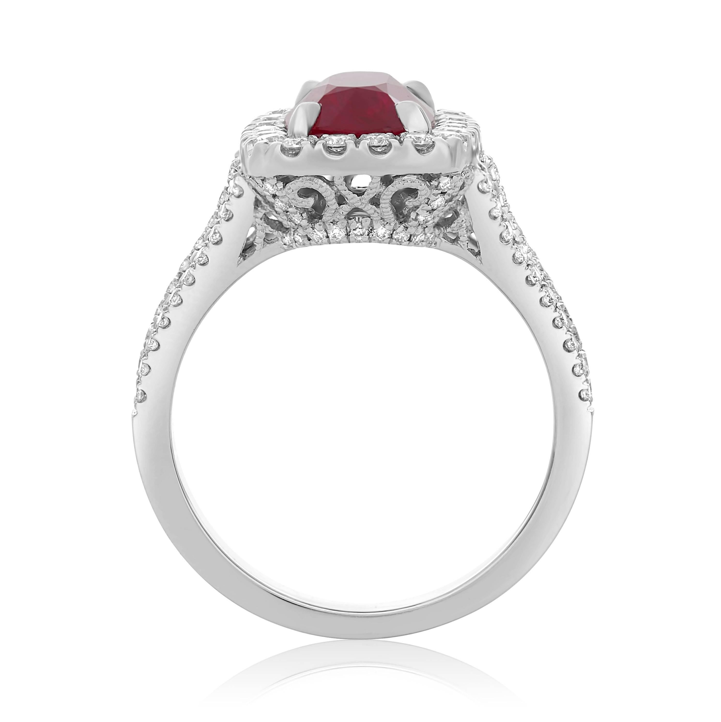 GIA certified 3.09 carat Cushion Cut Ruby ring with pave diamond halo. Split shank design with pave diamonds running one quarter way down the shank. Ruby is the July birthstone making this a perfect gift for any occasion for the July babies in your