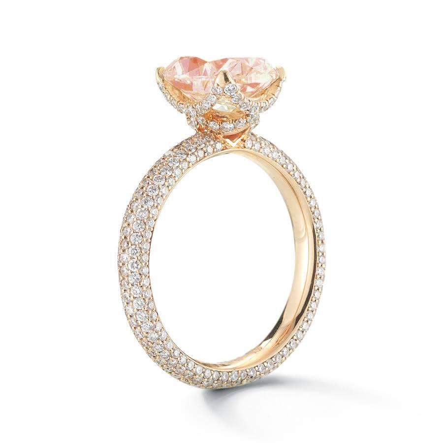 A Douglas Elliott 18k rose gold 'Victoria Rose' setting featuring 2.36 carats of micro pave diamonds and a two carat oval Morganite center stone. This ring features a basket setting covered in micro pave around the center stone.  

This ring is