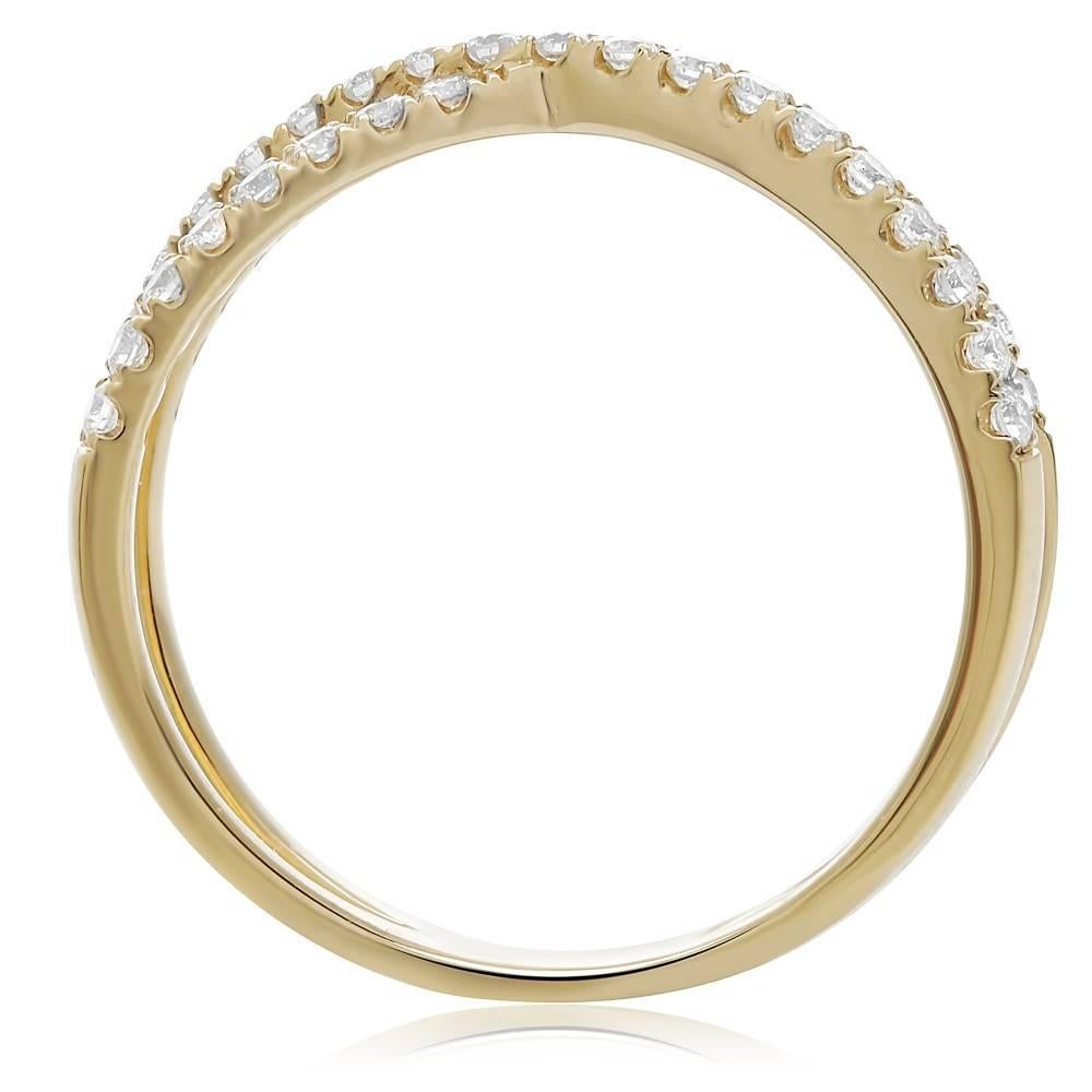 Fun Diamond Criss Cross Ring in 14kt Yellow Gold. Perfect to add to your jewelry collection or perfect as a push present or anniversary gift. Great for April babies as diamond is the birthstone for April. This ring contains 0.32 carats of perfectly