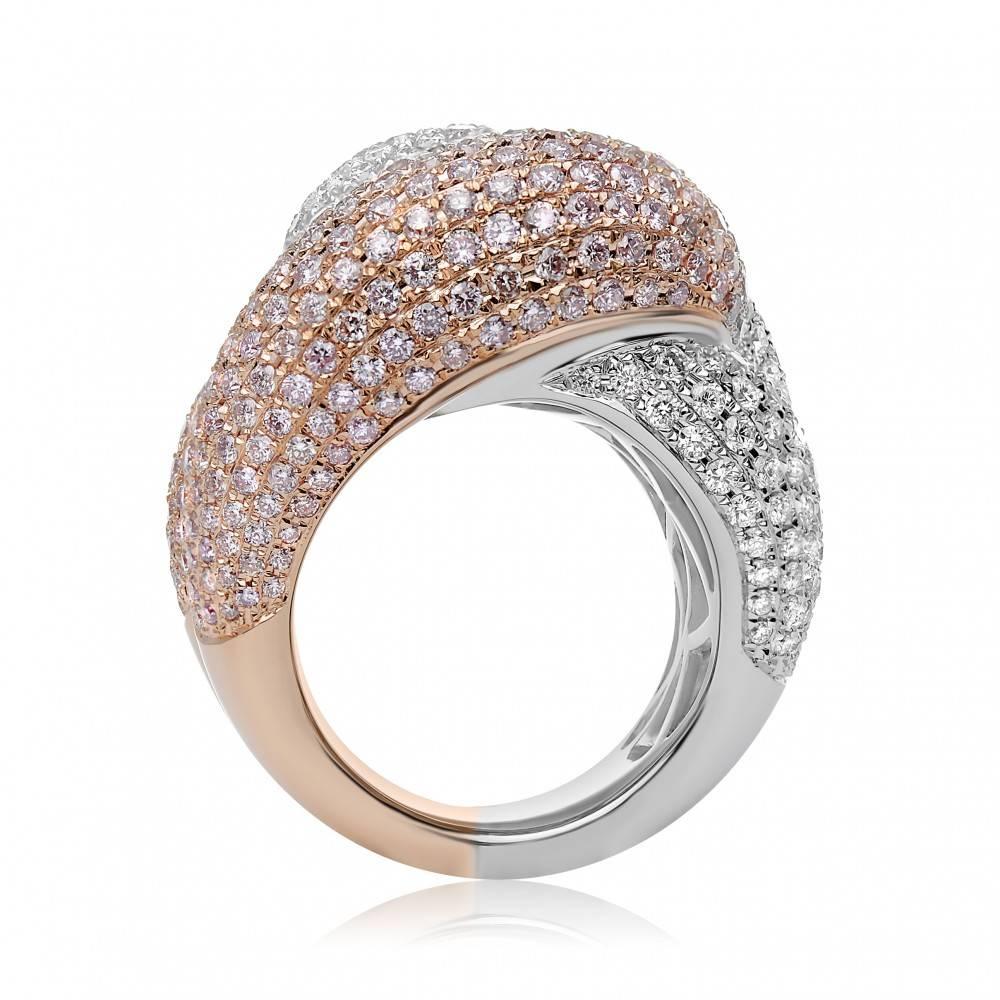 Pink Diamond and White Diamond Pave Cocktail Ring style Fashion Ring. This two tone gold ring is set in 18k rose gold and 18k white gold. Ring contains a total of 3.05 carats of fancy light pink to fancy pink diamonds. Diamonds are VS2/SI2 clarity