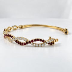 ADA Jewelry Red Ruby Twist Bangle, 14K Yellow Gold, 2.01 Carats